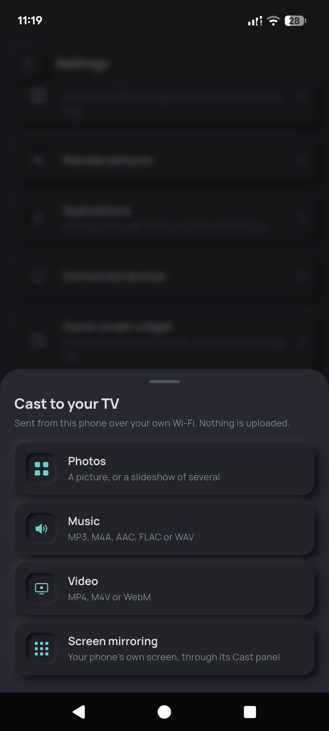 The Cast to your TV sheet offering photos, music, video and screen mirroring, with a note that nothing is uploaded