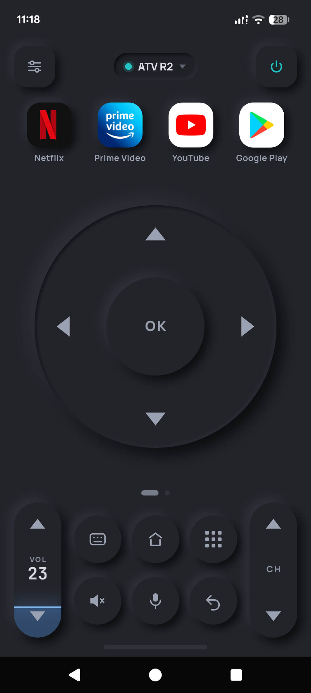 The TV Remote app controlling an Android TV: a large circular D-pad with an OK button, volume rocker showing volume 23, mute, voice search and channel keys